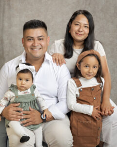 Habitat homeowners, Ricardo and Ana Andrea, with their two children.
